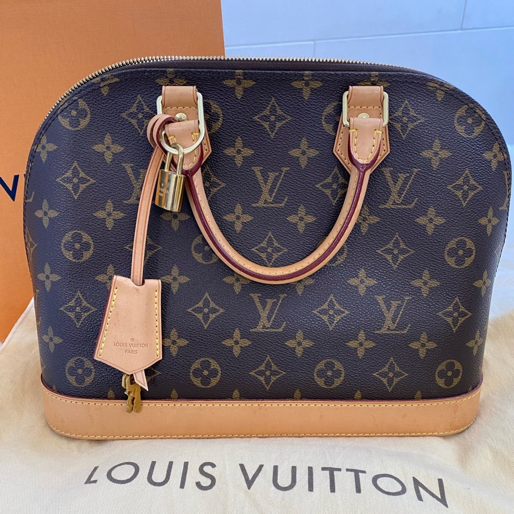 Authentic medium Alma monogram Louis Vuitton